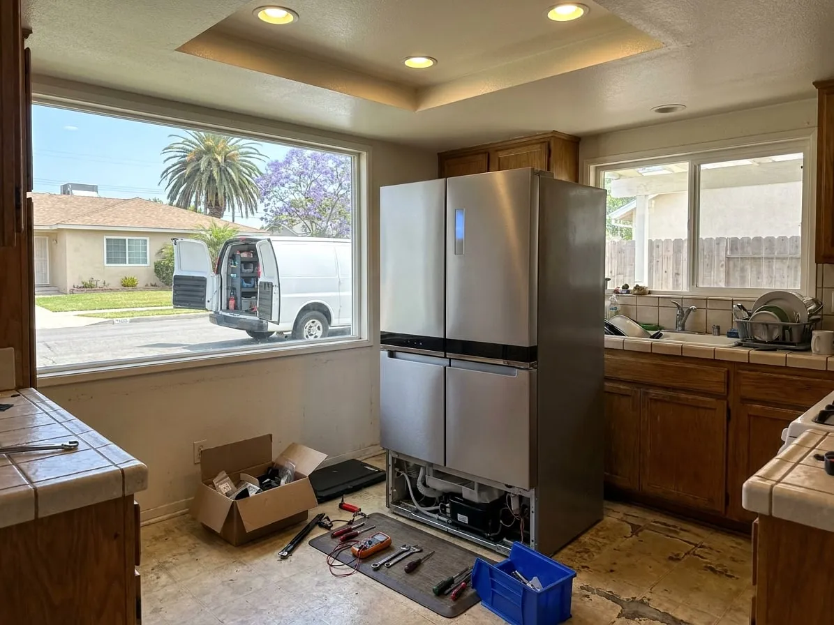 Plain white service van with open rear doors parked in front of a stucco house on a Southern California street